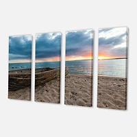 Designart - Rusty Row Boat on Sand at Sunset