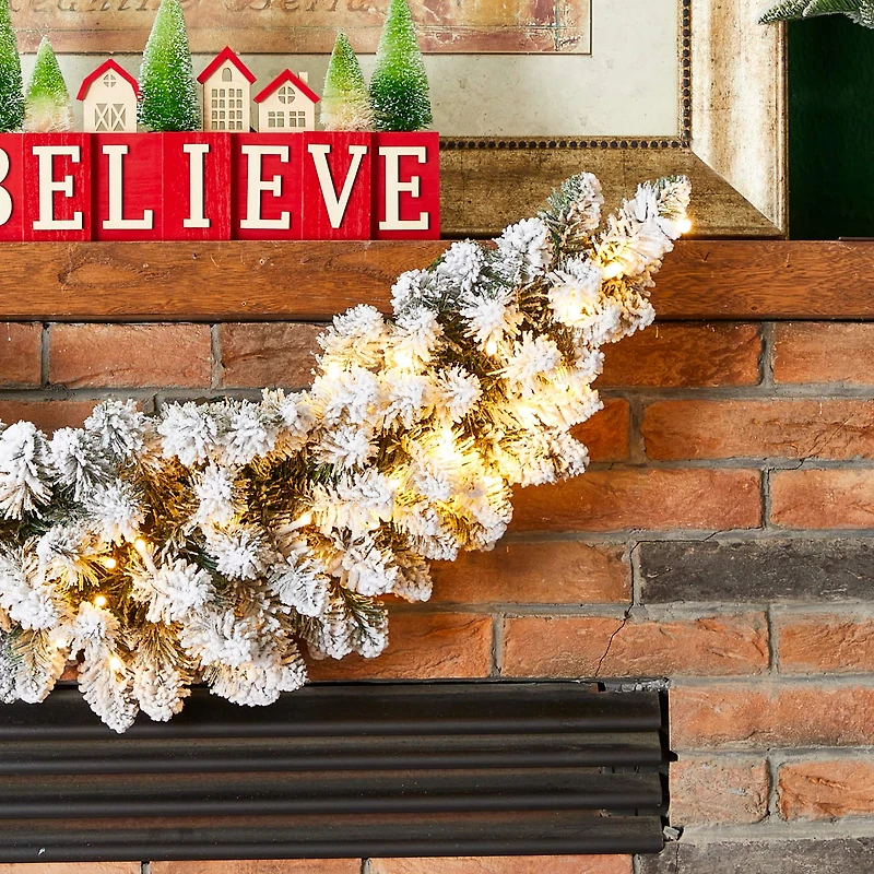 Glitzhome® 36" Pre-Lit Snow Flocked Christmas Swag with LED Lights