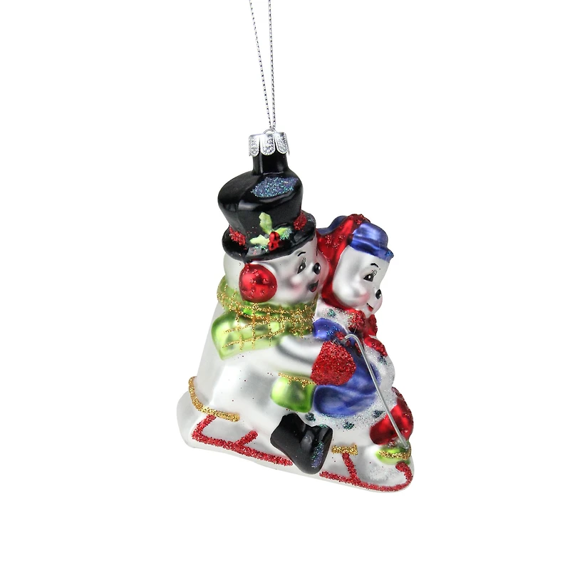 4.5" White & Red Cheerful Sledding Snowmen Couple Glass Christmas Ornament