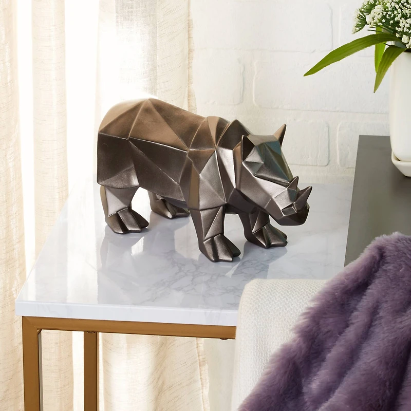 CosmoLiving by Cosmopolitan 10" Silver Polystone Rhino Sculpture