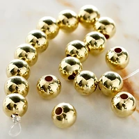 12 Pack: Gold Metal Round Beads, 8mm by Bead Landing™
