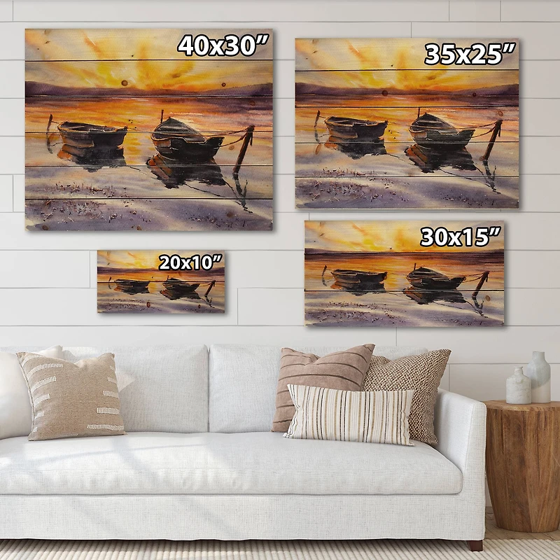 Designart - Sunset and Two Small Boats Parking On The Shore