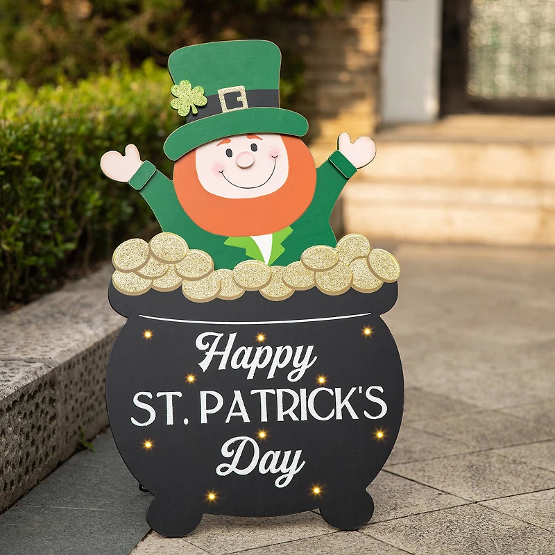 Glitzhome® 24" Lighted St. Patrick's Wooden Leprechaun Pot of Gold Décor