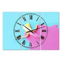 Designart 'Pink And Blue Banana Large Modern Multipanel Wall Clock