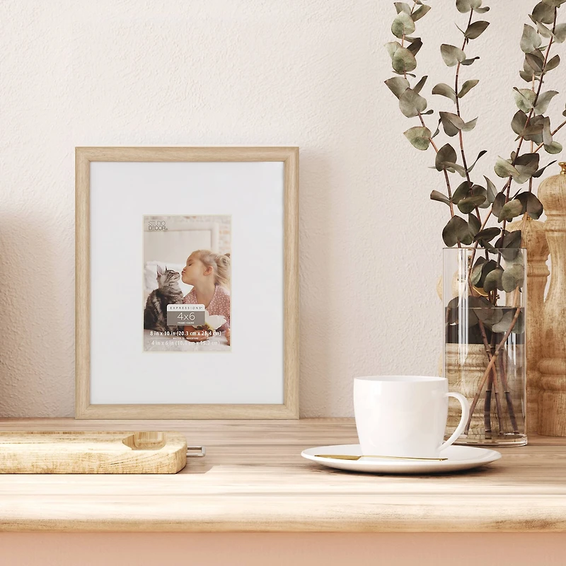 Expressions™ 4" x 6" Natural Woodgrain Frame with Mat by Studio Décor®