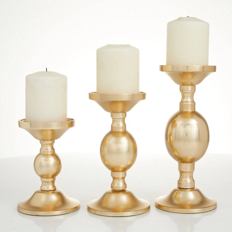 The Novogratz Set of 3 Gold Aluminum Transitional Candle Holders, 10" x 4" x 4"