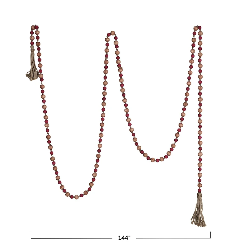 Hello Honey® 12ft. Pink & Red Paulownia Wood Beads with Jute Tassels Garland