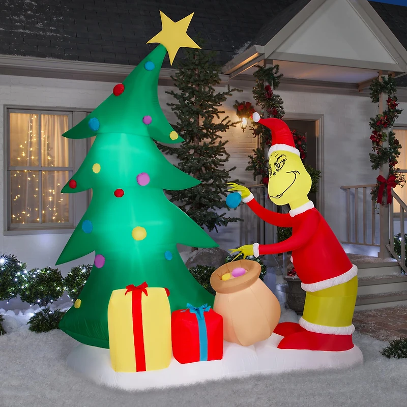 8.5ft. Airblown® Inflatable Christmas Grinch Putting Ornaments on Tree