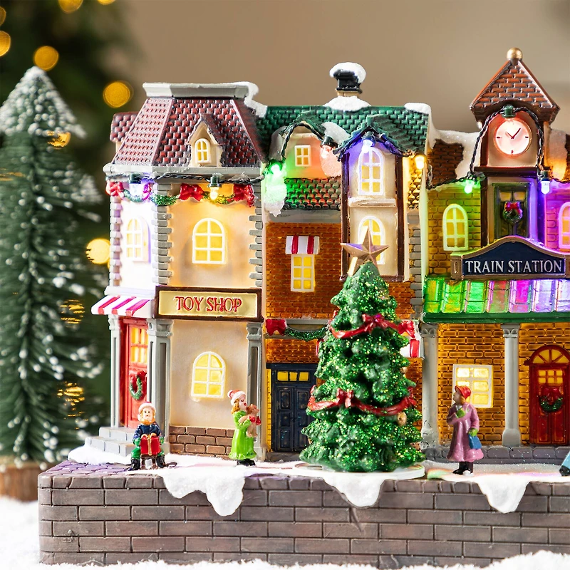Glitzhome® 13.75" Lighted Christmas Train station Resin Village with Movement and Music