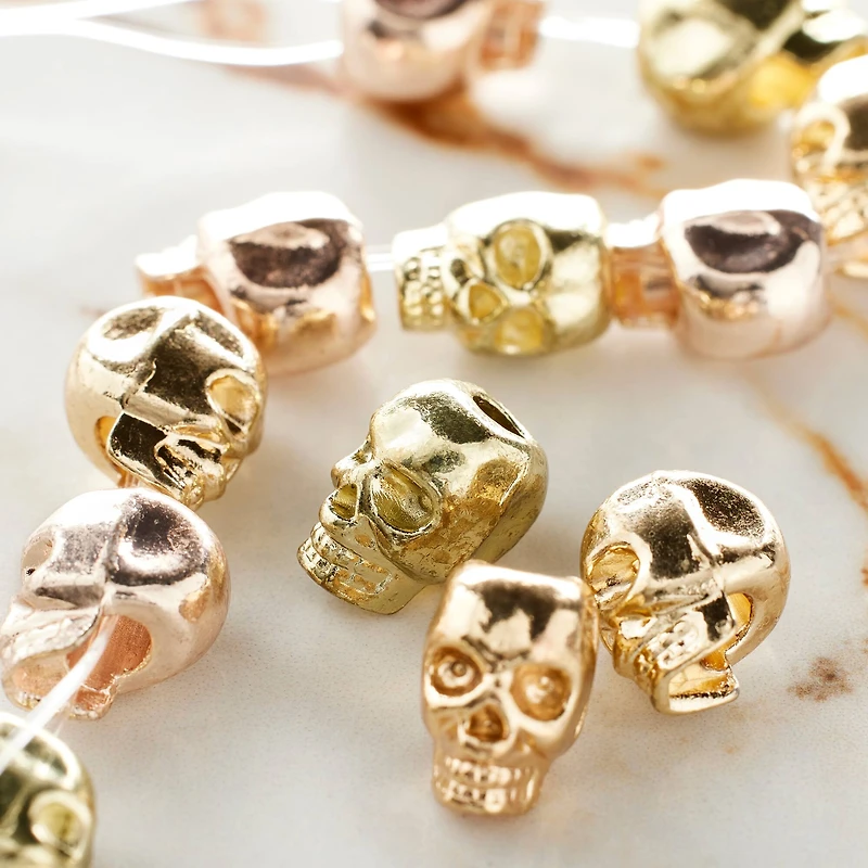 12 Pack: Gold & Rose Gold Metal Skull Beads, 12mm by Bead Landing™