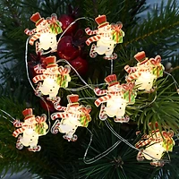 18ct. Warm White LED Skating Snowman String Lights on Silver Wire by Ashland®