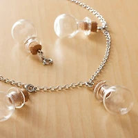 12 Packs: 4 ct. (48 total) Clear Potion Bottle Charms by Creatology™