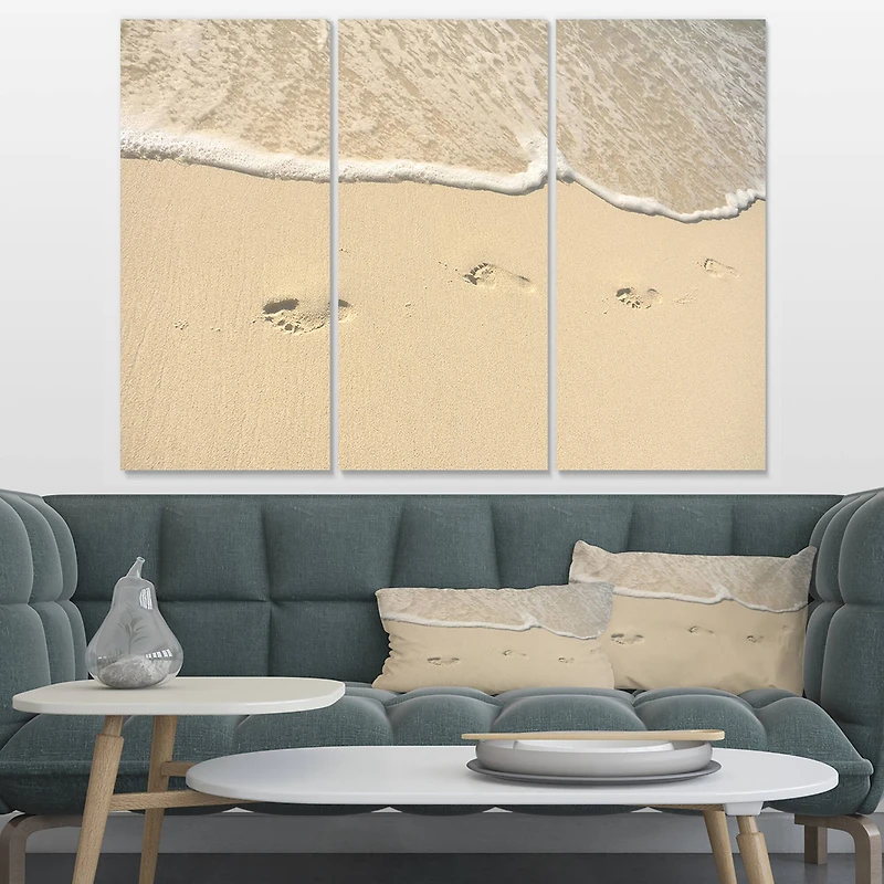 Designart - Footprints in Sand on the Beach