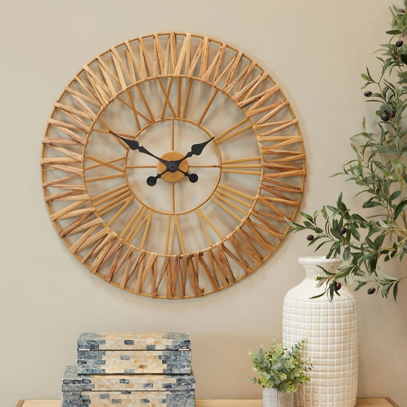 The Novogratz 30.5" Gold Seagrass Round Wall Clock with Weaving Design