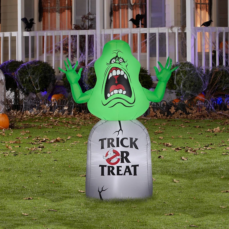 5ft. Airblown® Inflatable Halloween Ghostbusters Slimer on Tombstone