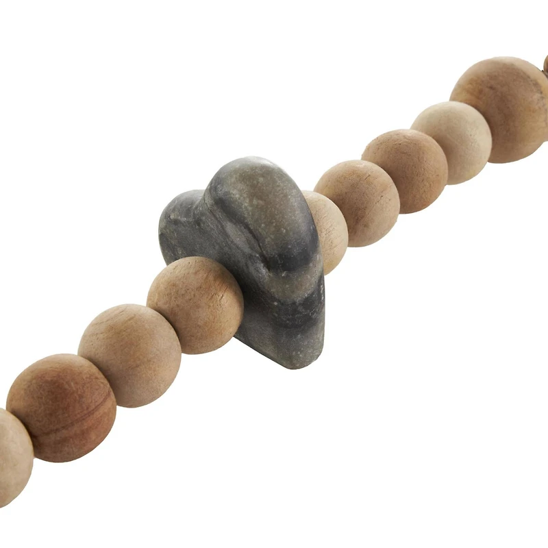 5ft. Light Brown Wood & Marble Heart Garland with Tassel 