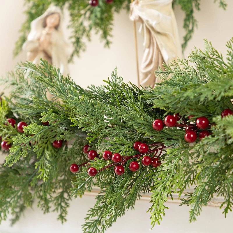 Glitzhome® 6ft Christmas Greenery PE Cedar Garland with Red Berries, 2ct.