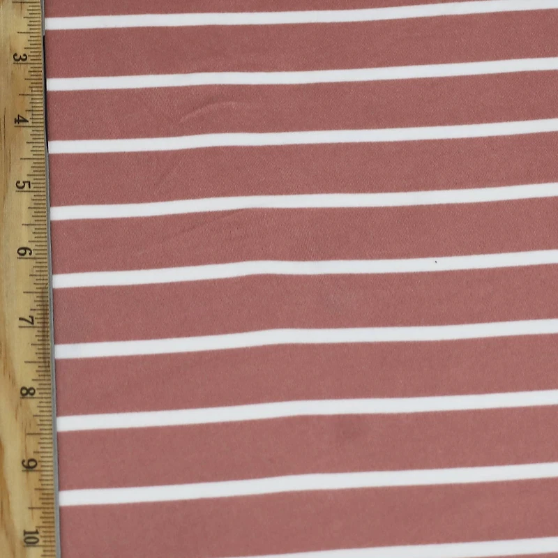 Fabric Merchants White Stripes on Mauve Double Brushed 4-Way Stretch Fabric
