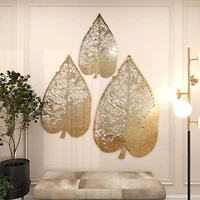 The Novogratz Laser-Cut Gold Metal Leaf Wall Décor Set