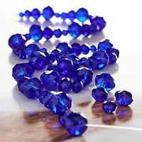 12 Packs: 4 ct. (48 total) Blue Faceted Glass Rondelle Beads by Bead Landing™