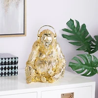 CosmoLiving by Cosmopolitan Gold Polystone Glam Sculpture, 14" x 10" x 10"