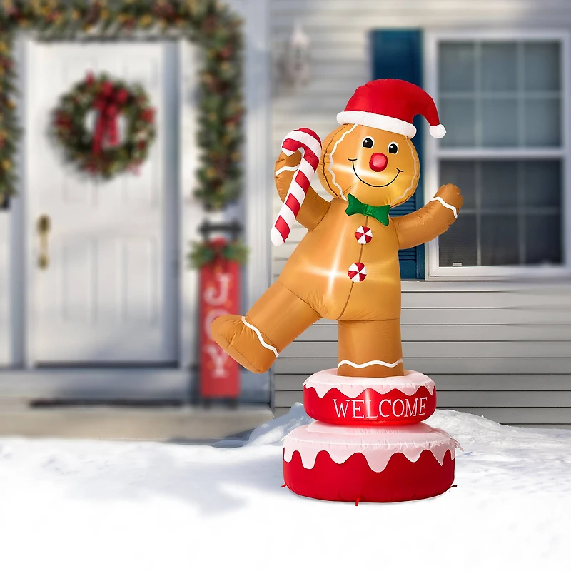 Glitzhome® 6ft. Lighted Inflatable Rotating Gingerbread Man Décor