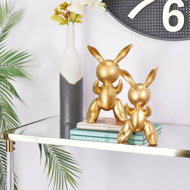 CosmoLiving by Cosmopolitan Set of 2 Gold Porcelain Glam Sculpture, 12" x 7" x 4"