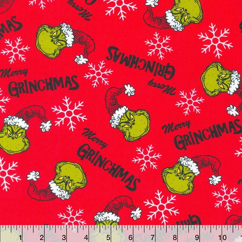 Dr. Seuss™ Merry Grinchmas on Red Cotton Fabric