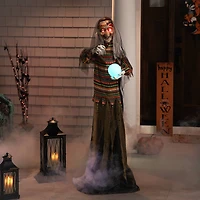 5.5ft. Pre-Lit Black & Green Standing Fortune Witch with Magic Ball Halloween Display