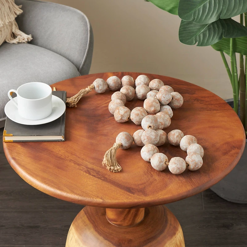 5ft. Paper Mache Round Distressed Beaded Garland with Tassel