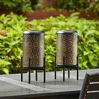 Glitzhome® 14.25" Black Metal Cutout Flower Pattern Solar Powered LED Outdoor Lanterns, 2ct.