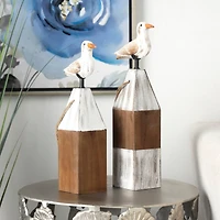 Brown Bird Sculpture with White Distressed Buoy Posts Set