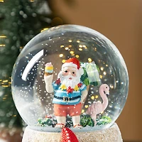 Glitzhome® 100mm Christmas Resin Musical Snowflakes Santa on Vacation Waterglobe