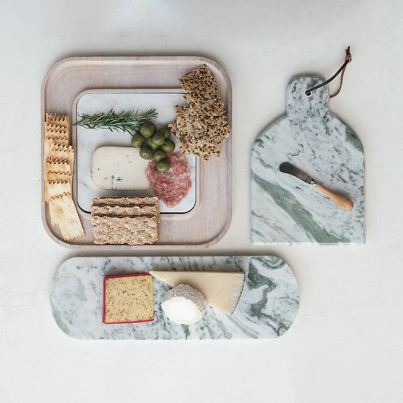 Hello Honey® 13.5" White Marble & Wood Cutting Board on a Dish