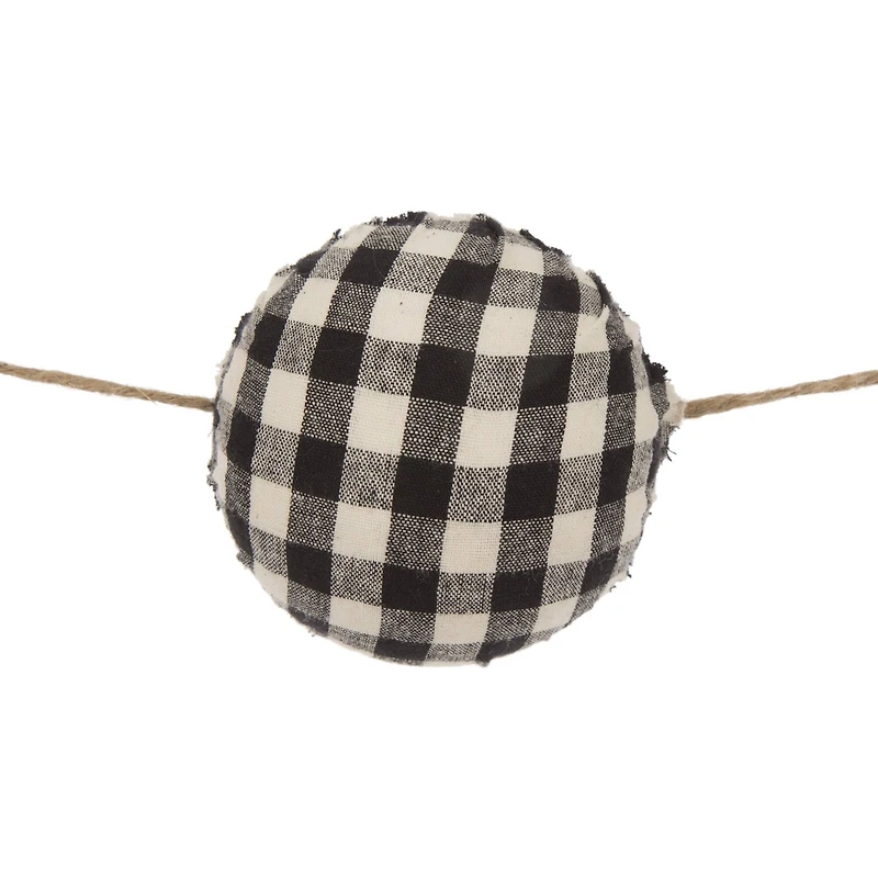 Glitzhome® 6ft. Black & White Plaid Fabric Garland