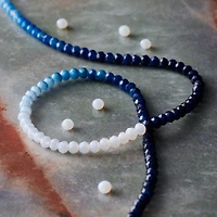 12 Pack: Blue & White Ombre Faceted Glass Rondelle Beads by Bead Landing™