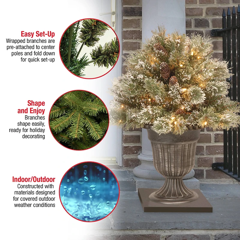 24" Glittery Bristle® Pine Porch Bush in Dark Bronze Plastic Urn with White Tipped Cones