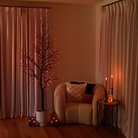 7ft. Pre-Lit Halloween Deluxe Black Twig Artificial Tree with 180 Orange & Purple LED Lights