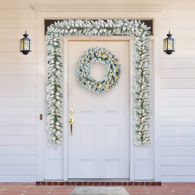 Glitzhome® 6ft. Pre-Lit Snow Flocked Christmas Garland, 2ct.