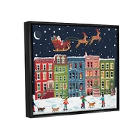 Stupell Industries Snowy Christmas Town Santa Overhead Framed Floater Canvas Wall Art
