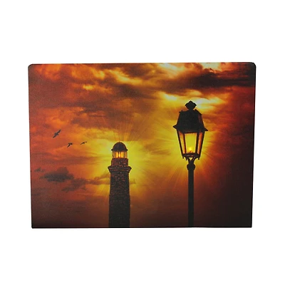 LED Lighthouse & Lamp Post with Amber Sky Canvas Wall Art