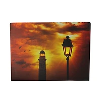 LED Lighthouse & Lamp Post with Amber Sky Canvas Wall Art