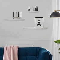 White Floating Shelves with Crown Molding