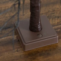 22in. Pre-Lit Artificial Halloween Brown Twig Tree with 12 Orange LED Pumpkin Shaped Lights