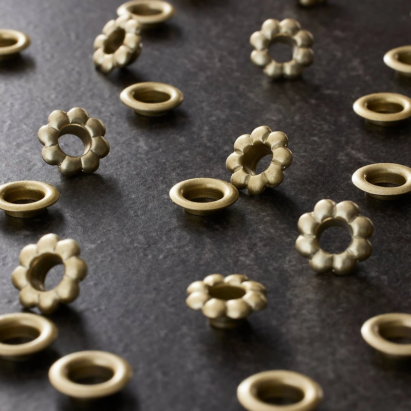 12 Packs: 50 ct. (600 total) 3/16" Flower Eyelets by Loops & Threads™