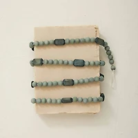 Hello Honey® 6ft. Gray Paulownia Wood Beads Garland