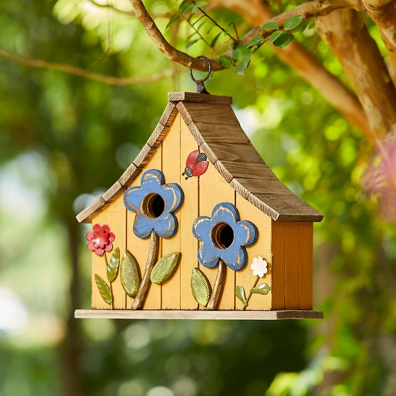 Glitzhome® 10.5" Yellow Distressed Wood Birdhouse with Flowers