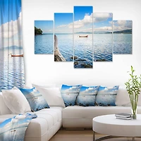 Designart - Small Wooden Boat and Tree Trunk