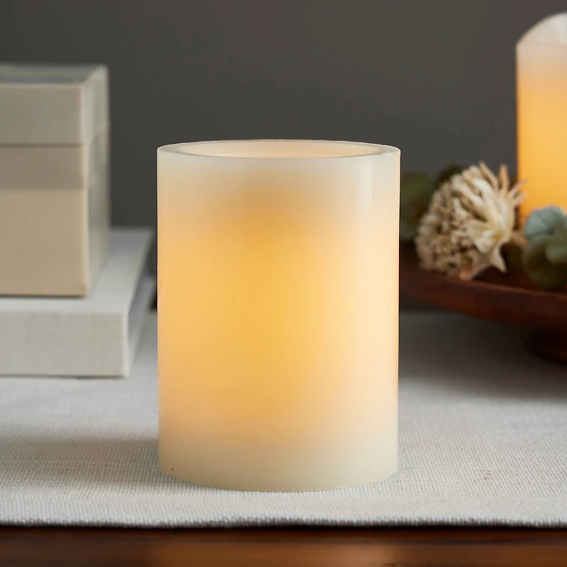 12 Pack: 3" x 4" Cream LED Wax Pillar Candle by Ashland®