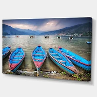 Designart - Row of Blue Boats in Pokhara Lake - Large Boat Canvas Art Print